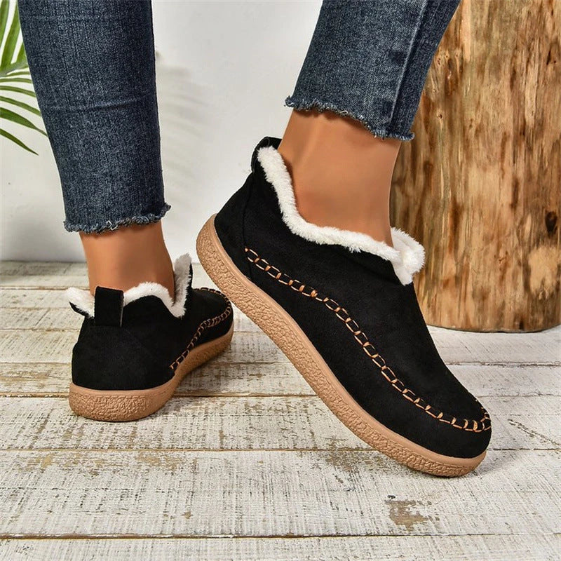 Stylish plush ankle boots for women featuring a unique V-cut design, soft interior, and durable materials for warmth and comfort in cold weather.