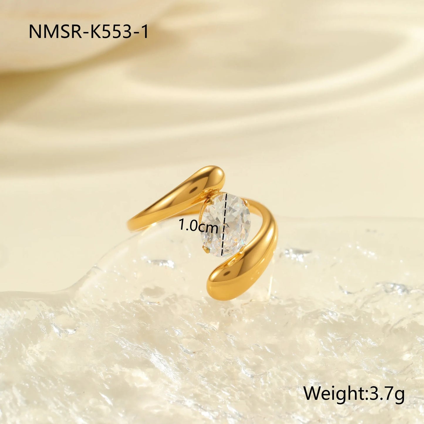 Geometric zircon ring showing round, oval and quadrangular design elements in stainless steel with electroplated finish