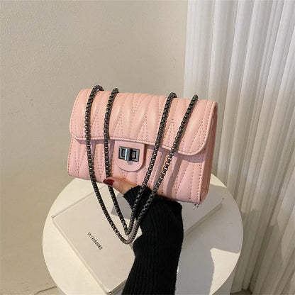 Retro textured diamond pattern women's small bag in beige colour with soft carry handle and single shoulder strap