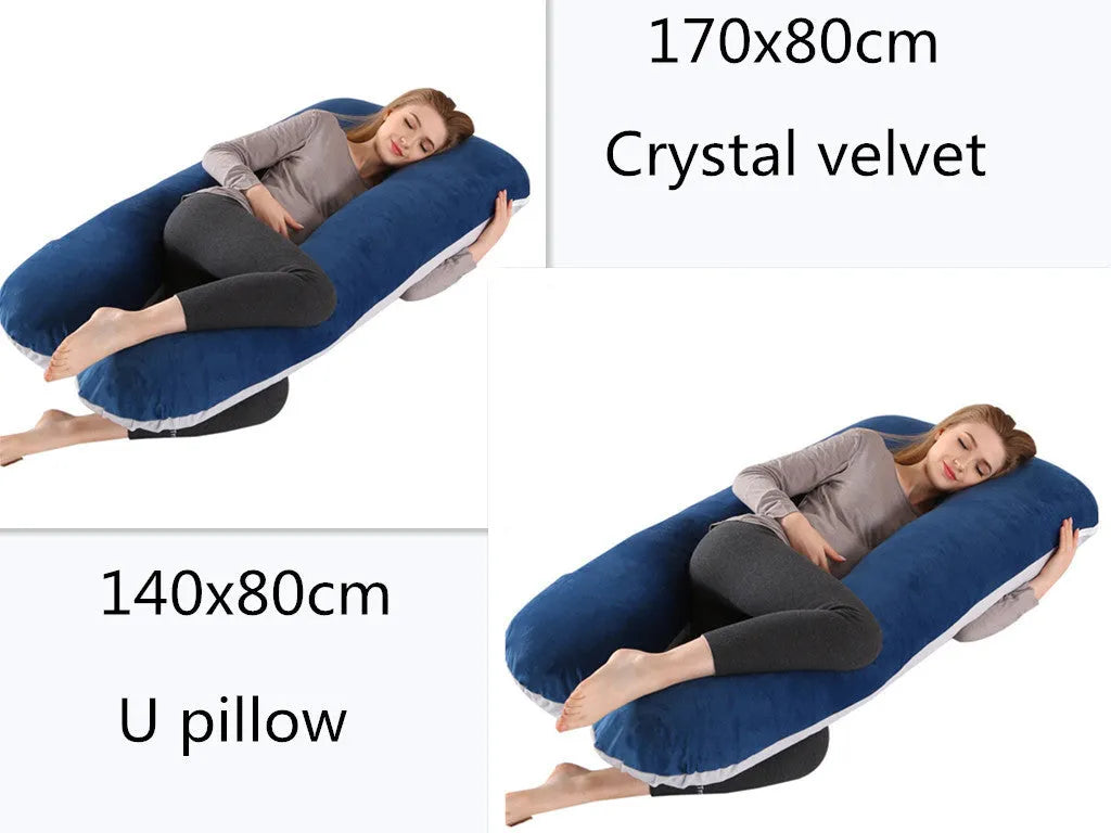 Large U-shaped pregnancy support pillow with removable cover and abdominal support belt.