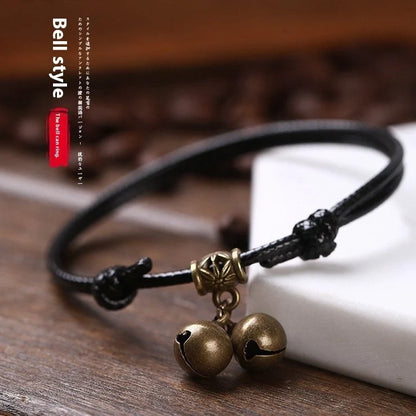 Adjustable nylon rope dog collar with brass bell in black, red, and coffee colour options