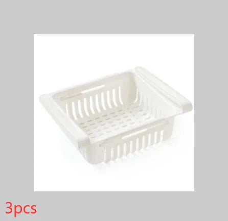 Plastic telescopic refrigerator storage basket in apricot colour, showing multiple compartments for organisation.