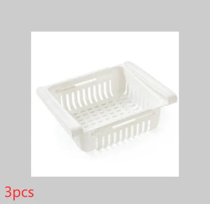 Plastic telescopic refrigerator storage basket in apricot colour, showing multiple compartments for organisation.