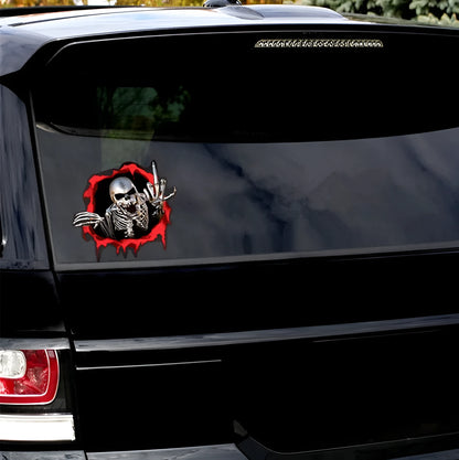 Reflective metal skull bumper sticker with colourful broken shell design on white background