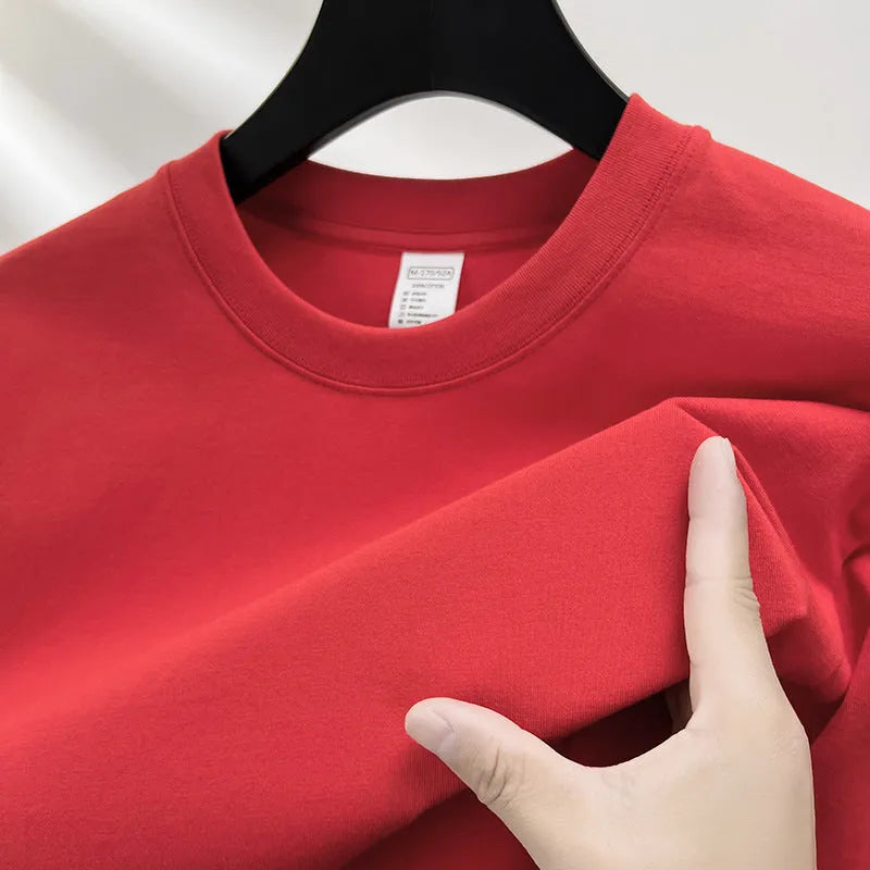 Men's drop shoulder t-shirt in thin cotton fabric, shown in a solid colour.