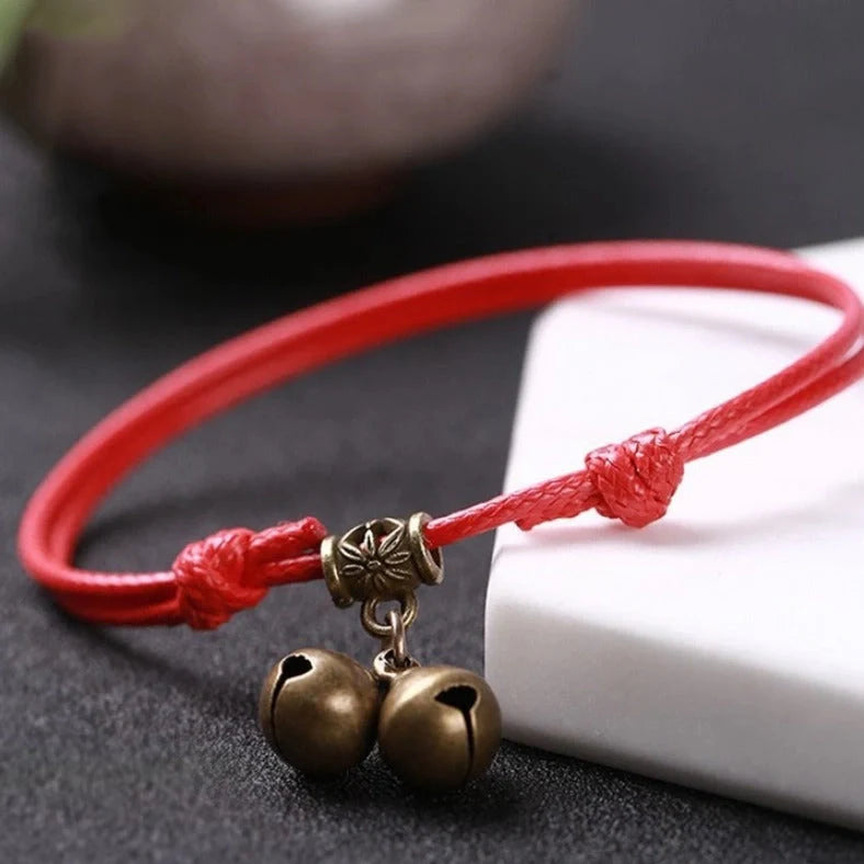 Adjustable nylon rope dog collar with brass bell in black, red, and coffee colour options