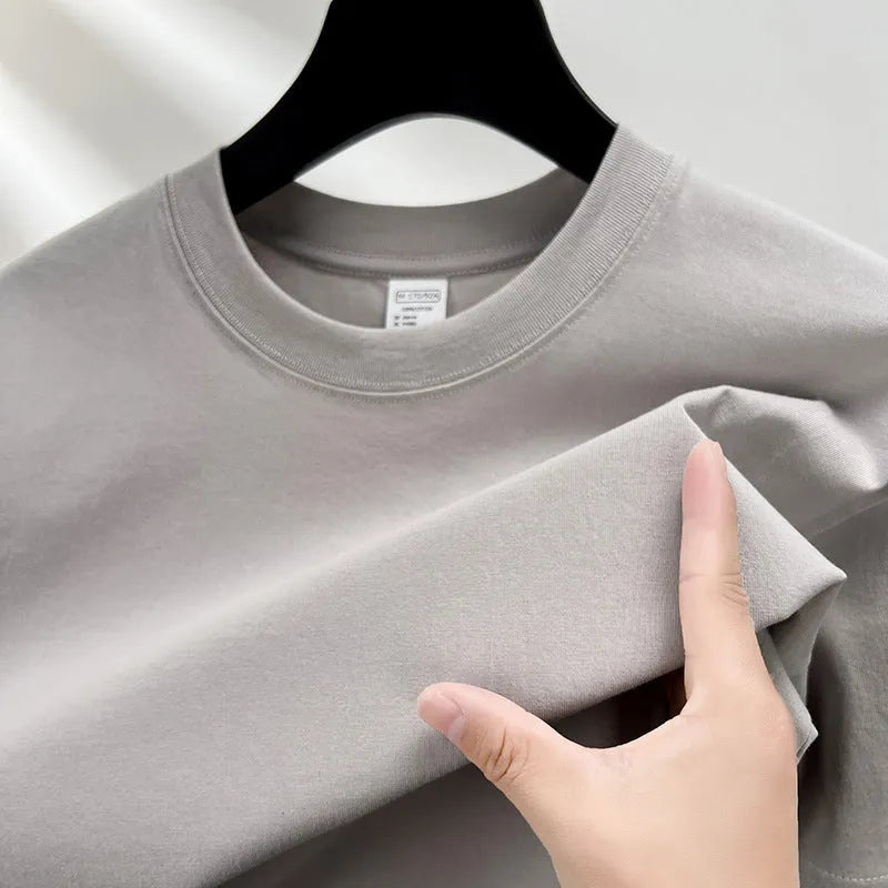 Men's drop shoulder t-shirt in thin cotton fabric, shown in a solid colour.