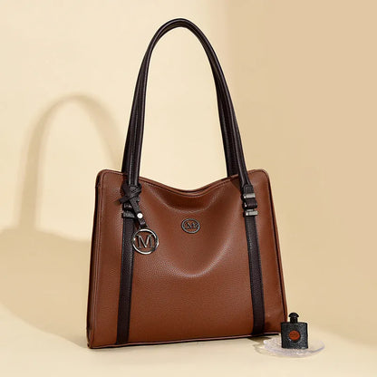 A soft PU leather women's crossbody bag in a retro style with double shoulder straps, shown in a choice of colours.