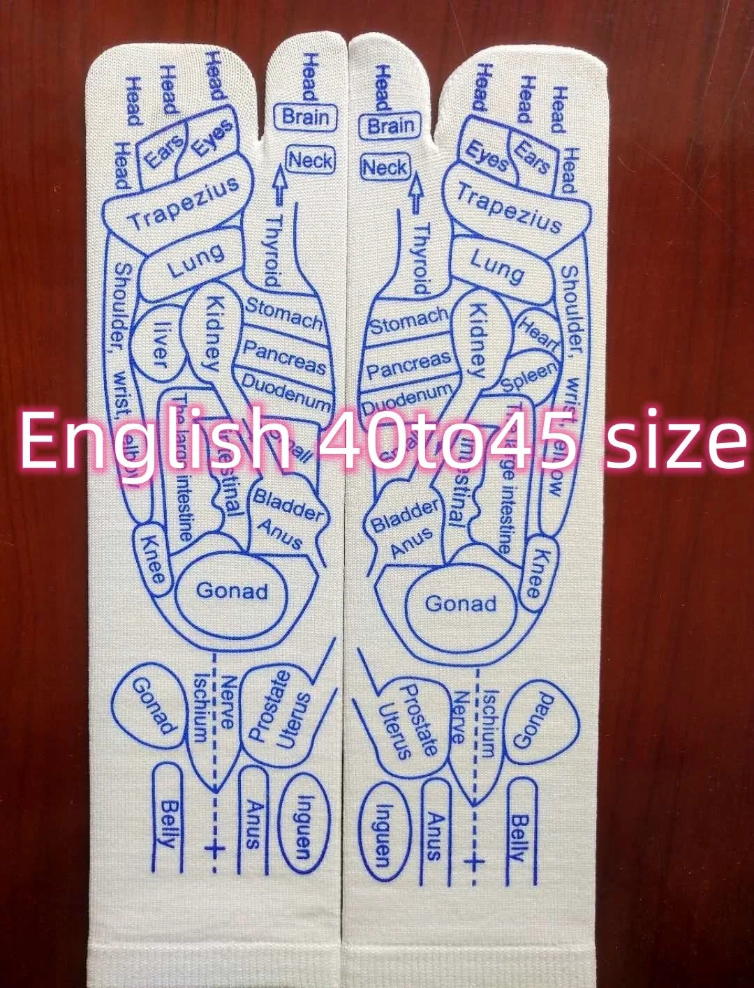 Acupressure foot massager socks with reflexology charts for targeted relief