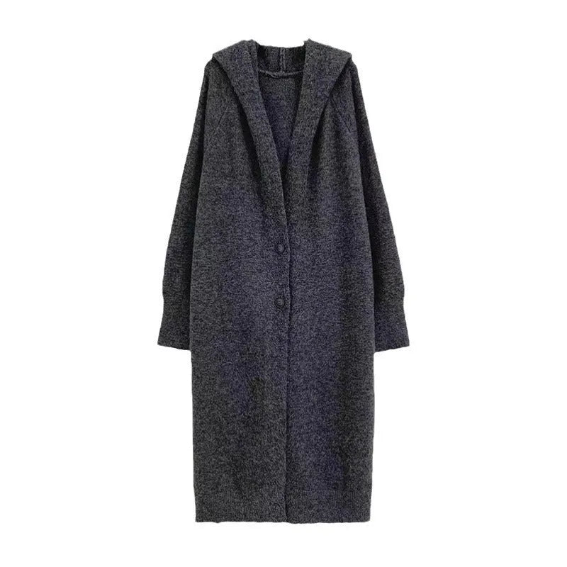 Women's Korean style hooded long knitted cardigan in oatmeal colour, showing loose fit and below-the-knee length