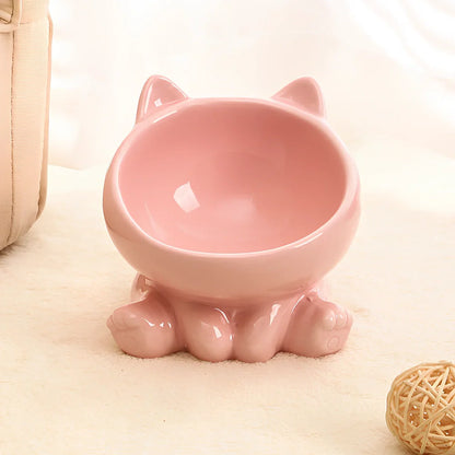 Black and white ceramic cat bowl with oblique mouth and neck guard for reduced whisker fatigue