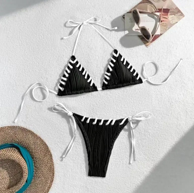 Women's solid colour polyester bikini with eye rope detail, briefs style, sizes S M L