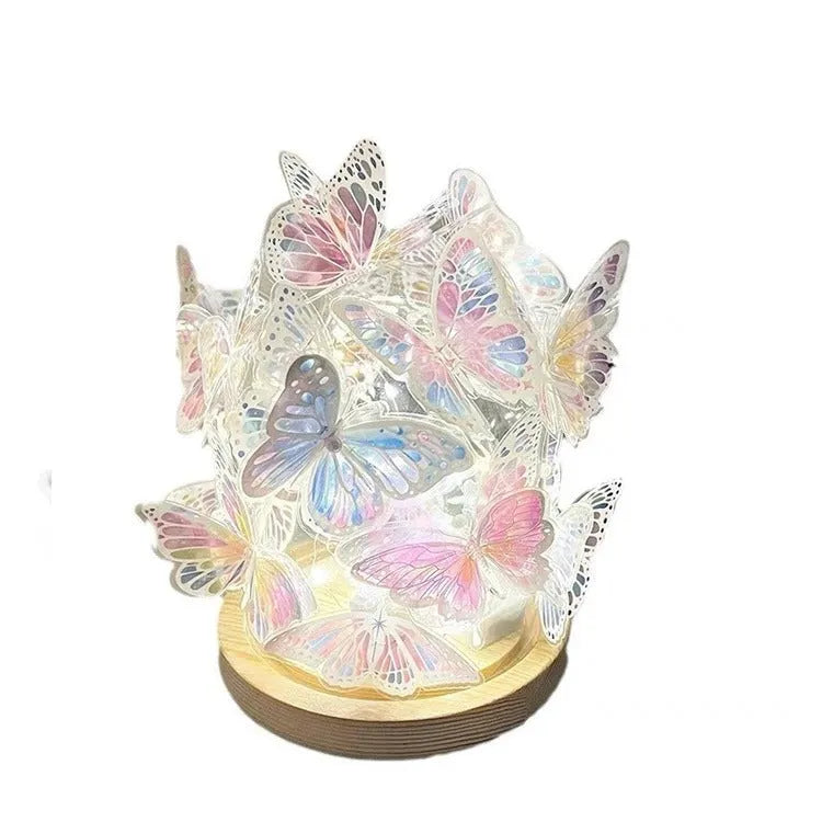 Handmade butterfly night lamp with glass shade on raw wood base, 12cm by 15cm.