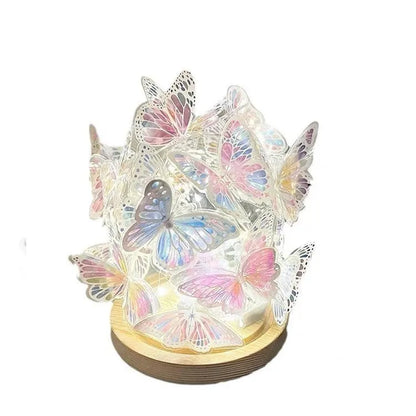 Handmade butterfly night lamp with glass shade on raw wood base, 12cm by 15cm.