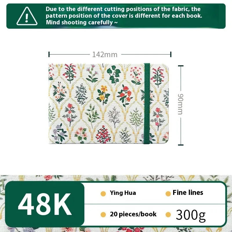Feiluniao watercolour notebook with fabric cover, 185mm length, open to show paper for painting.