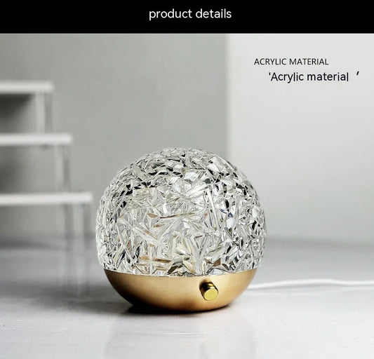 Spherical water ripple projector night light with touch controls creating colourful aurora patterns on wall