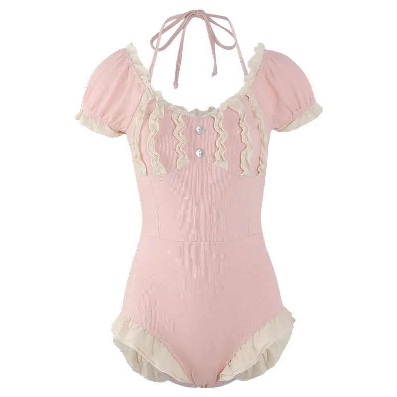 Pink women's conservative one-piece swimsuit with Siamese cut design