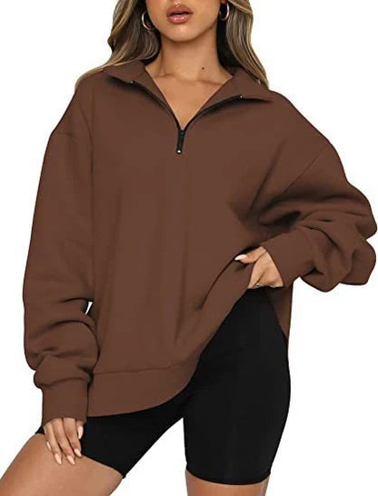 Women's zip turndown collar sweatshirt in various colors, showcasing loose fit and zipper detail.