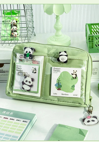 Green canvas pencil case with panda design featuring 12 storage layers for stationery organisation