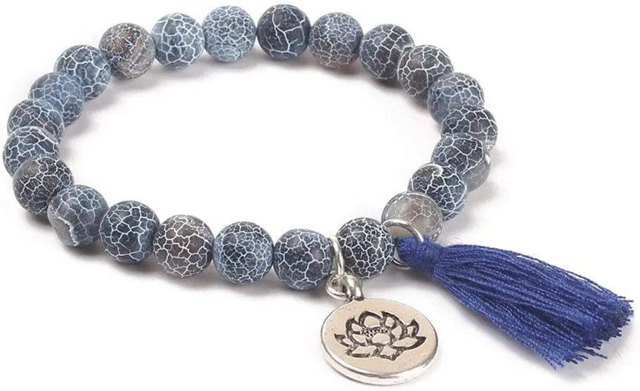 Handcrafted natural stone bracelet with alloy volcano white turquoise charm in a simple design.