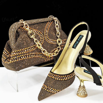 Women's pointed toe high heel court shoes in blue with rhinestone detail and a matching small bag.