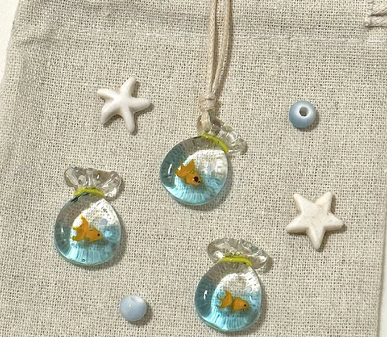 Women's necklace with coloured glaze pendant on a cotton-linen chain, showcasing world-style design