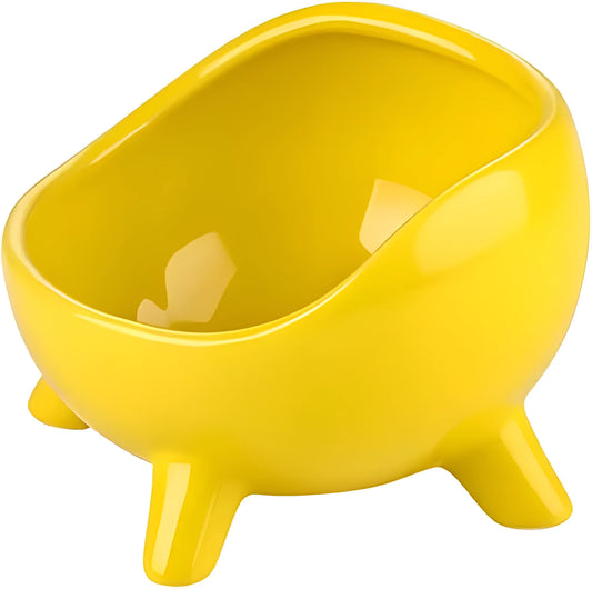 Green ceramic cat food bowl with four legs and elevated design for stable feeding