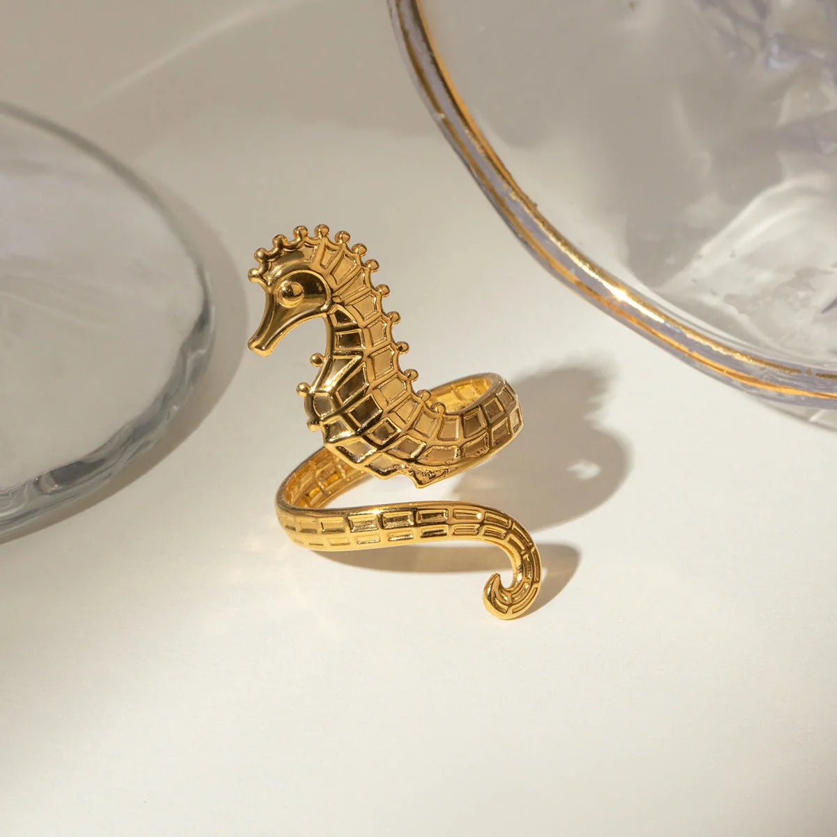 Shimmering 18K gold stainless steel cocktail ring with intricate seahorse design
