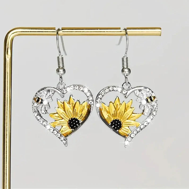Stylish silver bee sunflower heart earrings for women, perfect for nature lovers.
