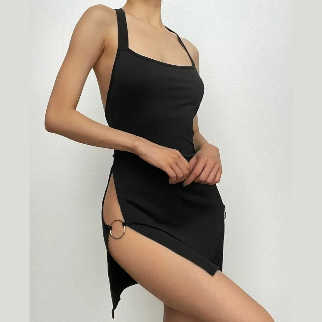 Backless Hollow-out Halter Women's Tight Dress in milk silk fabric, available in black, cameo brown, red, green, and rose red.