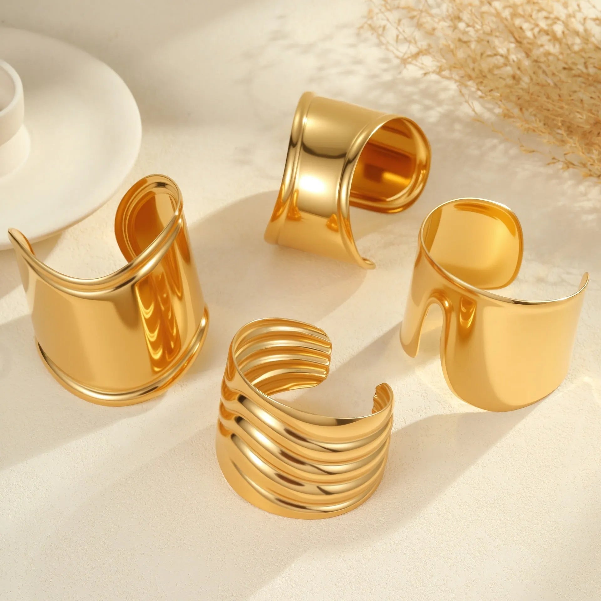 Women's gold-plated wide bracelet with exaggerated niche opening and geometric wave design