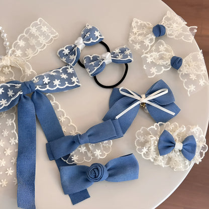 Cloth barrette hairpin set showing blue bow, beige lace, and pearl butterfly designs
