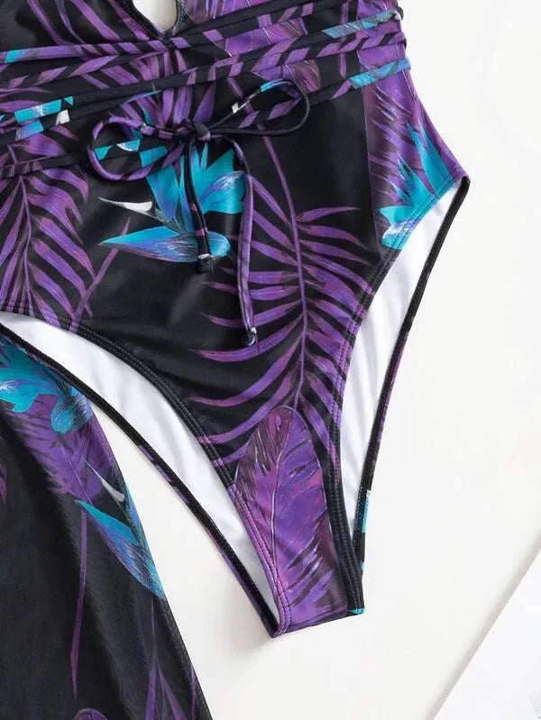 Women's three-piece swimsuit set showing bikini one-piece design with matching cover-up coat