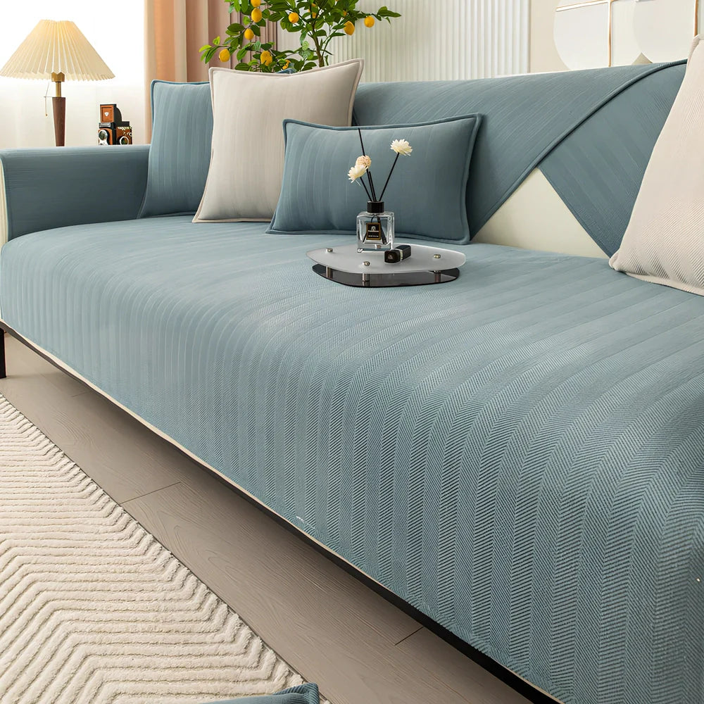 Chenille sofa cushion cover in army green with matching pillowcase on grey sofa