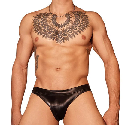 Men's black shark skin lace briefs on a white background, showing textured hipster design.