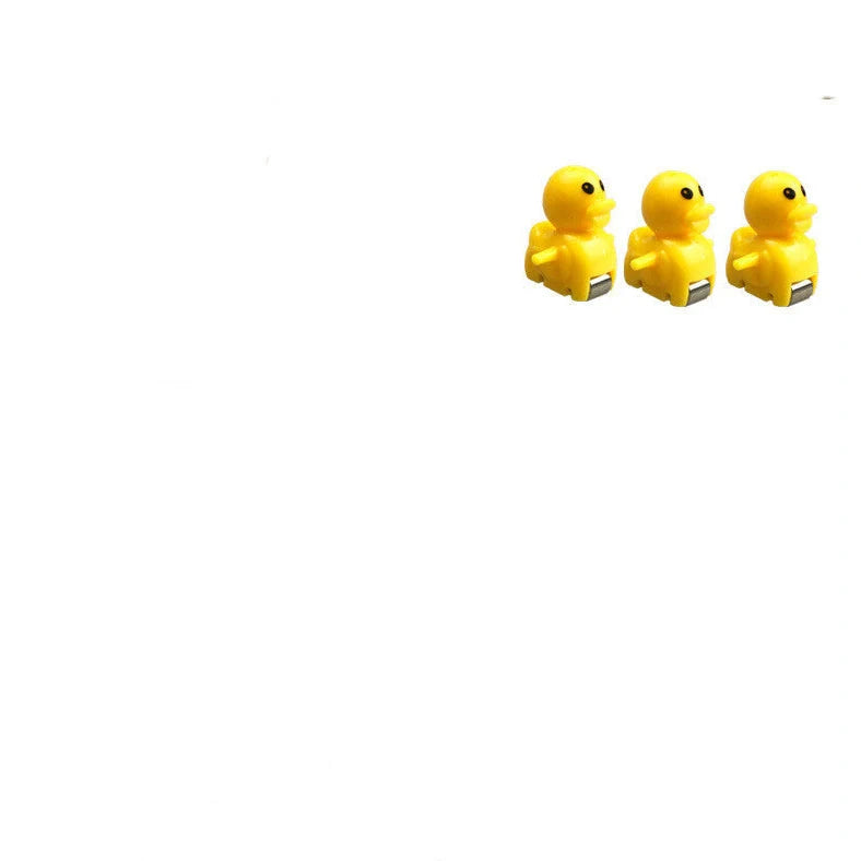 Little Duck Climbing Stairs Toy showing three yellow ducks on rotating slide with colourful LED lights