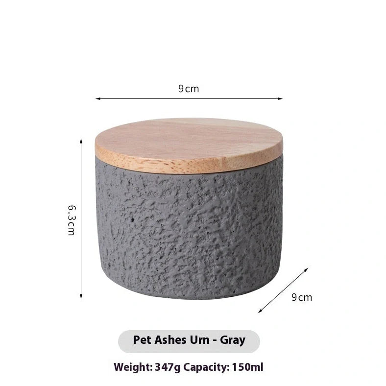 Handmade cement cinerary casket for pet ashes in six colours: black, grey, green, pink, white, yellow