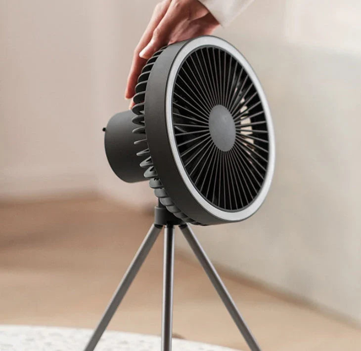 Versatile USB Rechargeable Camping Fan with Tripod Stand and Lantern, offering a premium aluminum alloy construction, 3-in-1 design, and powerful brushless motor for a refreshing outdoor experience.