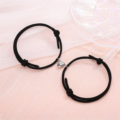 Fashionable magnetic couple bracelets with heart-shaped charms in various color options