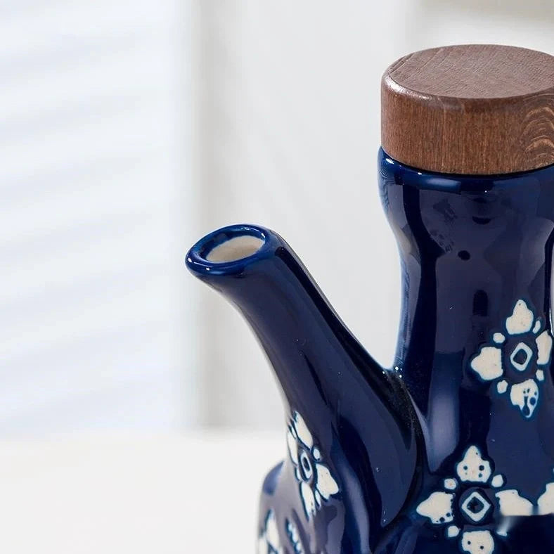 Ceramic oil pot with automatic shut-off, 520ml capacity, printed floral design in blue or wine red