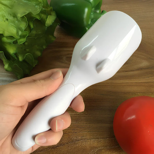 19.5cm long cake batter scoop with push-button mechanism and non-stick surface for consistent cupcake portioning