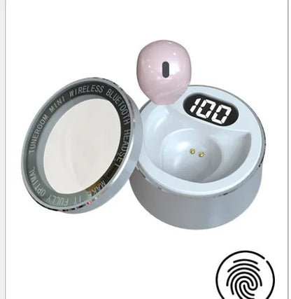 Invisible mini in-ear Bluetooth headset with 9mm discreet design in skin tone colour showing flush ear fit