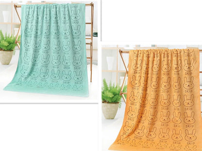 Microfiber bath towel with cartoon character print measuring 70cm wide by 140cm long