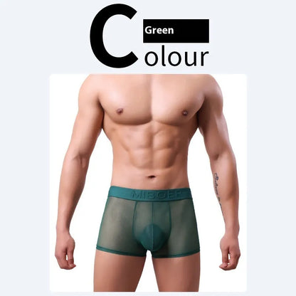Men's thin solid colour boxer shorts in black, laid flat to show knit texture and seamless design