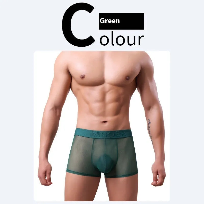 Men's thin knit boxer shorts in black, laid flat to show seamless design and waistband.