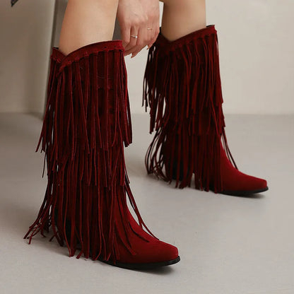 Women's knee-high suede boots with a chunky heel and square toe.