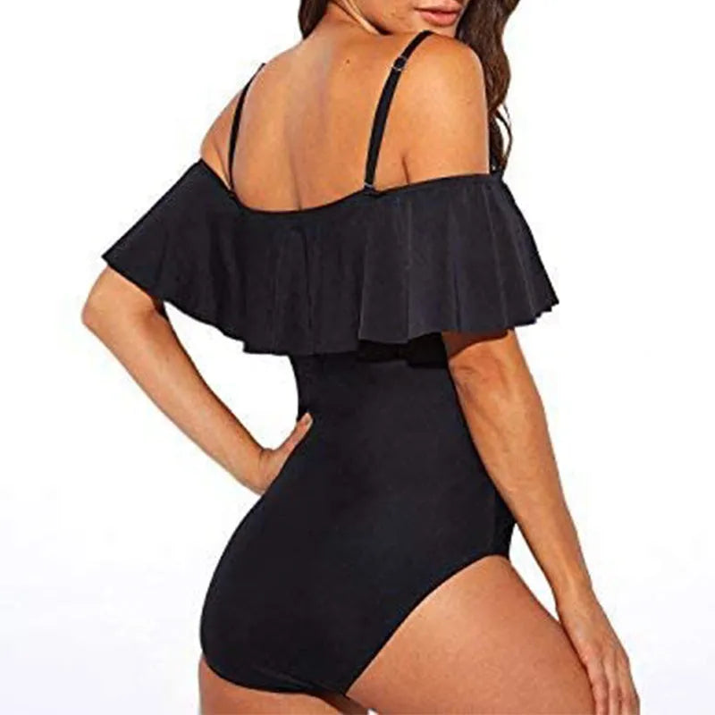 Black one-piece swimsuit with ruffled straps and cut-out design for swimming sports
