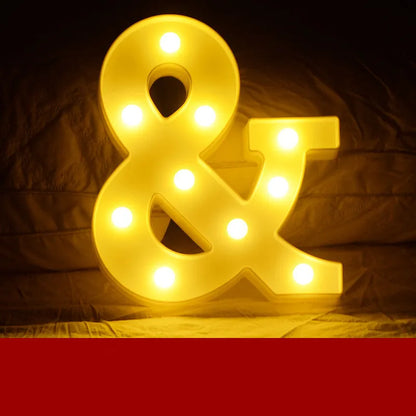 Plastic LED alphabet letter light spelling a message for a birthday or proposal.