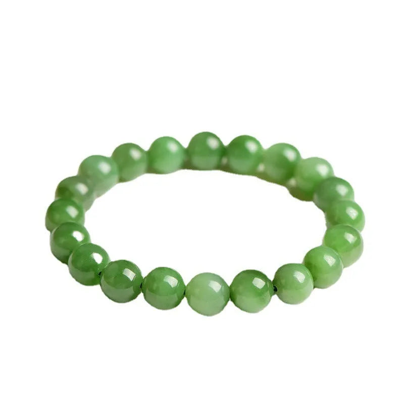 Natural jasper ball bracelet with polished Hetian jade beads in multiple sizes from 4mm to 12mm on wrist