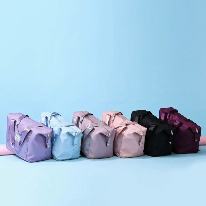 Spacious fitness travel bag with various pockets and compartments for organizing gym, yoga, and outdoor gear